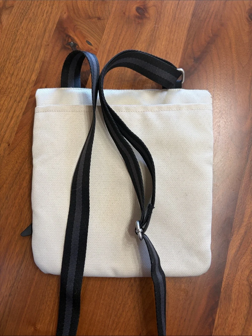Sherpani Black & Cream Fold-Top Crossbody Backpack with Red Tag